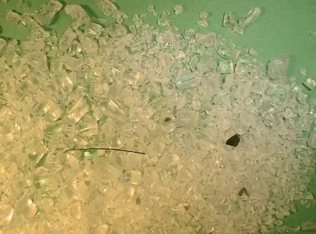 Polycarbonate regrind before cleaning